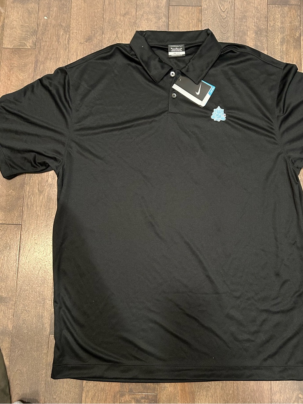 Nike Black Polo with Light Blue Chest Patch
